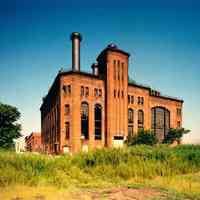 B+W photo of the exterior of the Hudson and Manhattan Powerhouse in Jersey City, no date, ca. 1998.