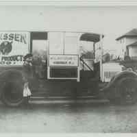 B+W copy photo of Hoboken resident Anthony "Hank" Fantaccione with Janssen Dairy Products milk truck, Hoboken.