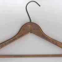 Wooden coat hanger stamped Tapper Bros.,132 Washington St., Hoboken, N.J., ca 1930