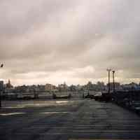 Three color photographs of Pier A area including demolition underway on Pier A headhouse, Hoboken, no date, ca. 1996-1998.