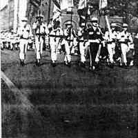 Digital image of photocopy of b+w photo of Our Lady of Grace Lancers marching north on Washington St., Hoboken, no date, ca. 1950.