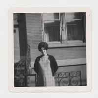          B+W photo of Donald Fontana's mother(?) posed outside building, Hoboken, n.d., ca. 1963. picture number 1
   