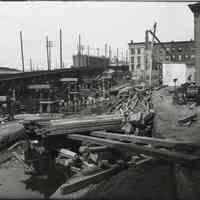 Digital image of b+w photo of site preparation for the Hudson & Manhattan Railroad maintenance building at Hudson Place, Hoboken, June 23, 1906.