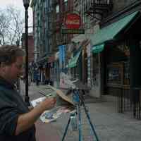 Color photos, 11, of artist Frank Hanavan working on a painting of Giorgio