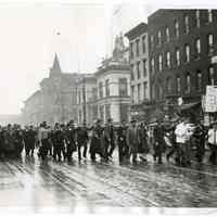 B+W photo of Stevens Institute students in snake line celebrating legalization of 3.2 pct beer, on Washington St. north of First St. Hoboken, Apr. 7, 1933.