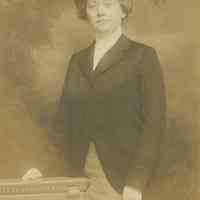 Photo postcard of an unidentified young woman, probably Florence Miller, posing in a photo studio, no place (probably Atlantic City, N.J), no date.