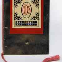          front cover, full cord and tassel
   