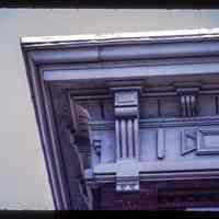 Color slide of detail view of cornice, bracket and frieze at 1321 Washington on the SE corner with 14th