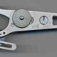          bottom view with letter size adapter attached
   