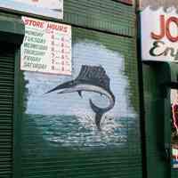 Color photo of store hours sign for Joseph Apicella & Sons, Seafood Market, 307 First St., Hoboken, Jan. 3 & 4, 2002.