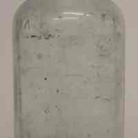 Bottle: Davis OK Baking Powder. Product made by R. B. Davis Co., Hoboken, n.d., ca. 1900-1910.