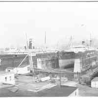 B+W photo of the S.S. City of Savannah in dry dock no. 3; the S.S. Pipestone County in dry dock no. 2, Hoboken, no date, ca. 1940.