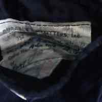          label sewn inside pocket with Wassman name
   