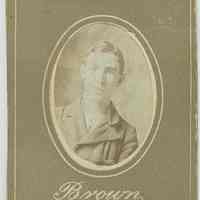 Oval sepia-tone penny photo of unknown young boy (ca.8-12 y.o.) on printed mount, Hoboken, no date, ca. 1900.