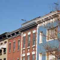          143: east side of Washington St. near Seventh St.; upper floors, cornices
   