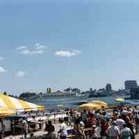 Color photos, 3, of pier 5 and River City Fair, Hoboken, September 1987.