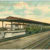 Digital image of Hudson & Manhattan R.R. postcard titled: Manhattan Transfer Station showing Rapid Transit Train, N.Y. to Newark. n.d., ca 1913.