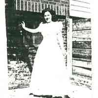 Black-and-white photocopy of photo of Mary Ratti in the backyard of 721 Adams St., Hoboken, 1940.