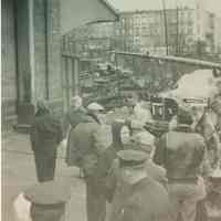 B+W candid photo of "On the Waterfront" filming in Hoboken: preparation/ rehearsal for a scene, Hoboken, no date, ca. late 1953-early 1954.