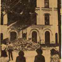 Newsclipping of captioned photo of demolition underway on Stevens Academy, Hoboken from New York Times, no date, probably May 16, 1976.