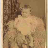 Cabinet photo of ca. 4-5 year old boy posed in studio, Hoboken, n.d., ca. 1885-1895.