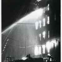 B+W photo of firemen fighting a tenement fire at 121 Clinton St., Hoboken, Jan. 20, 1979.