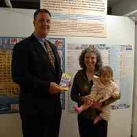 Color photos, 3, of Carol Losos with daughter Tessa & PSE&G representative at Kids Map Hoboken exhibit, HHM, Hoboken, Nov. 14, 2006.