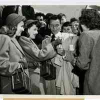 Sinatra photo: Frank Sinatra being greeted by fans at LaGuardia Field, New York, Apr. 10, 1947.