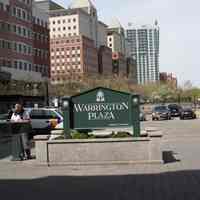          051 view north of Warrington Plaza sign and bronze plaque on pedestal
   