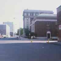 Color photo looking north up River St. with the Main Post Office at center right, Hoboken, no date, ca. 1975.