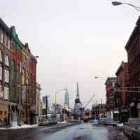          148: Fourteenth Street looking east from Bloomfield St.; shipyard crane
   