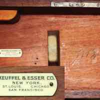          detail inside lid with K&E plate and model number scribed to right
   