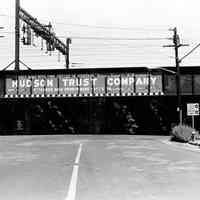 B+W photo of a railroad bridge with painted sign at Jersey & Hoboken Aves., Jersey City, N.J., no date (ca. 1968-72).