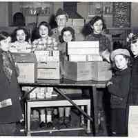 B+W photo of Hoboken Girl Scouts preparing for annual cookie sale, Hoboken, 1950.