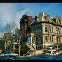          Color slide of eye-level view of front and side facades showing gable dormers and mansard roof at 901 Castle Point Terrace on the NE corner of 9th picture number 1
   