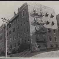 B&W photo of apartment building at unknown location in New Jersey.