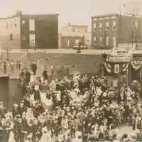 Color copy photo of a sepia-tone photo of May Walk street scene in the Third Ward, Hoboken, N.J., May, 1950.