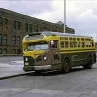 Color slide photo of Washington St. bus at bus stop on Hudson Pl. near River St., Hoboken, June 25, 1972.