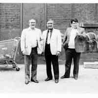 B+W photo of mayoral candidate Tom Vezzetti and two unidentified men at unidentified location, Hoboken, no date, ca. June 1985.