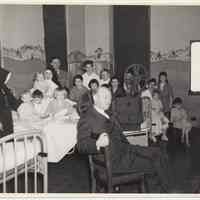 B+W photo of movies being shown to children in St. Mary Hospital by Hoboken YMCA, Hoboken, Apr. 3, 1948.