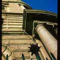 Color slide of detail view of metal railing, façade, cornice and pillar of the Hudson Trust Company building at 80 Hudson on the corner of Hudson and Newark