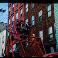 Color slide of kids on a truck ride.