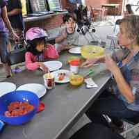          0029 Robin Westervelt & children making candy
   