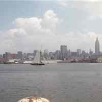 Color photo of the sloop Clearwater on the Hudson River off Hoboken, Aug. 1981.