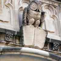          17 detail of owl over apartment building entrance 515 Adams St.
   
