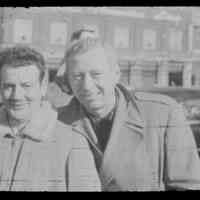 Color slide of a two unidentified men on pier set of the motion picture "On the Waterfront", Hoboken, no date, ca. late 1953-early 1954.