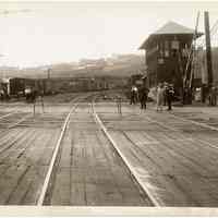 B+W photo looking west on 17th St. across Willow Ave. from east of Willow; streetcar tracks & freight rail crossing, Hoboken, n.d., (1927).