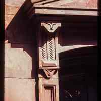          Color slide of detail view of pediment, bracket and transom window on a building on Park between 10th and 11th picture number 1
   