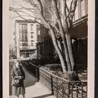Photo of Barbara Wood standing in front of her home at 64 10th Street Hoboken.