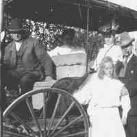 B+W negative image of some of the Miller family in a horse-drawn carriage, no place, no date, ca. 1900-1910.